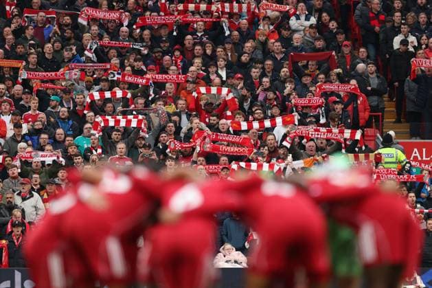 Liverpool fans hold up scarves ahead of the game. Liverpool v Manchester United, ManU Premier League, Football, Anfield, Liverpool, UK - 19 Oct 2025Liverpool Anfield United Kingdom EDITORIAL USE ONLY No use with unauthorised audio, video, data, fixture lists, club league logos or live services. Online in-match use limited to 120 images, no video emulation. No use in betting, games or single club league player publications. Copyright: xRyanxBrowne Shutterstockx 15548302ch