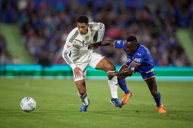 Jude Bellingham (Real Madrid CF) and Dakonam Ortega Djene (Getafe CF) battle for the ball during the LaLiga EA Sports match between Getafe CF v Real Madrid at Coliseum on October 19, 2025 in Getafe, Spain. (Photo by Manu Reino DeFodi Images) Jude Bellingham Real Madrid CF and Dakonam Ortega Djene Getafe CF battle for the ball during the LaLiga EA Sports match between Getafe CF v Real Madrid at Coliseum on October 19, 2025 in Getafe, Spain Photo by Manu Reino DeFodi Images