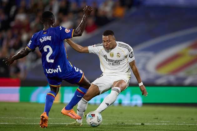 Kylian Mbappe (Real Madrid CF) and Dakonam Ortega Djene (Getafe CF) battle for the ball during the LaLiga EA Sports match between Getafe CF v Real Madrid at Coliseum on October 19, 2025 in Getafe, Spain. (Photo by Manu Reino DeFodi Images) Kylian Mbappe Real Madrid CF and Dakonam Ortega Djene Getafe CF battle for the ball during the LaLiga EA Sports match between Getafe CF v Real Madrid at Coliseum on October 19, 2025 in Getafe, Spain Photo by Manu Reino DeFodi Images