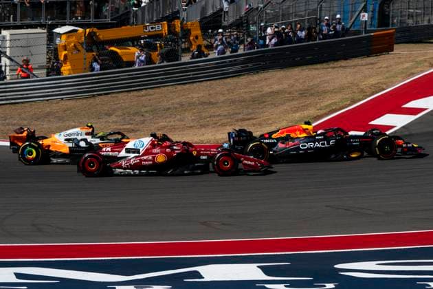 Dutch Formula One driver Max Verstappen of Red Bull Racing leads Monaco s Formula One driver Charles Leclerc of Scuderia Ferrari and British Formula One driver Lando Norris of McLaren F1 Team into turn one during the Formula One United States Grand Prix at the Circuit of the Americas in Austin, Texas on Sunday, October 19, 2025.  AUS2025101940 GREGxNASH