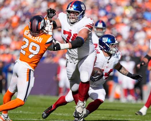October 19, 2025: New York Giants guard Greg van Roten (74) battles Denver Broncos cornerback Ja Quan McMillian (29) in the first half of the football game between the Denver Broncos and New York Giants. CSM. - ZUMAc04_ 20251019_zma_c04_254 Copyright: xDerekxRegensburgerx