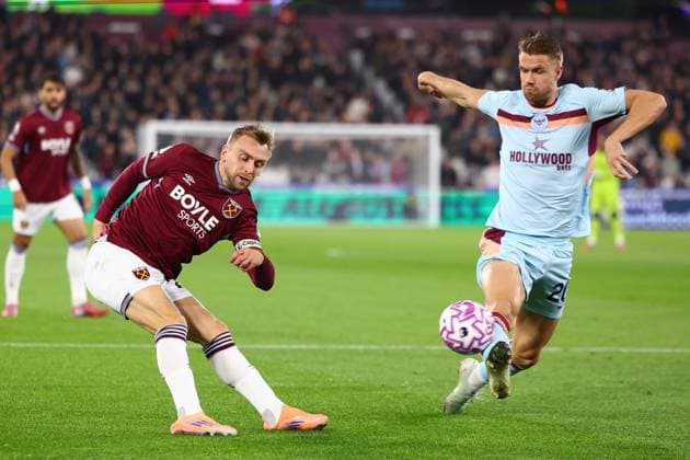 London, England, 20th October 2025. Jarrod Bowen of West Ham has his cross blocked by Kristoffer Ajer of Brentford during the West Ham United vs Brentford Premier League match at the London Stadium, London. Picture credit should read: Paul Terry Sportimage EDITORIAL USE ONLY. No use with unauthorised audio, video, data, fixture lists, club league logos or live services. Online in-match use limited to 120 images, no video emulation. No use in betting, games or single club league player publications. SPI_009_PT_West_Ham_Brentford SPI-4226-0009