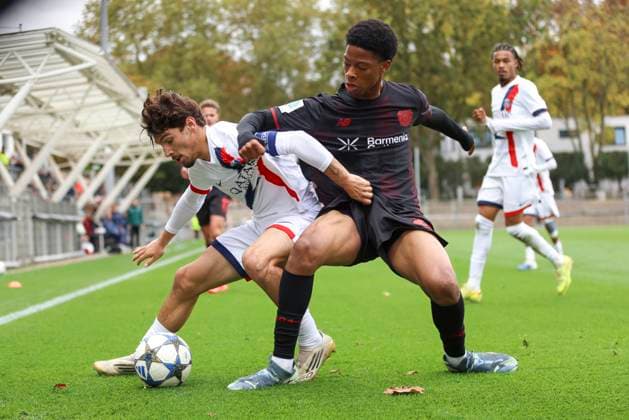 Thomas Cordier (FC Paris Saint-Germain U19) und Ivan Massek (Bayer Leverkusen U19) battle for the ball during the UEFA Youth League 2025 26 match between Bayer 04 Leverkusen and Paris Saint-Germain on October 21, 2025 in Leverkusen, Germany. (Photo by Oliver Kaelke DeFodi Images) Thomas Cordier FC Paris Saint Germain U19 and Ivan Massek Bayer Leverkusen U19 battle for the ball during the UEFA Youth League 2025 26 match between Bayer 04 Leverkusen and Paris Saint Germain on October 21, 2025 in Leverkusen, Germany Photo by Oliver Kaelke DeFodi Images