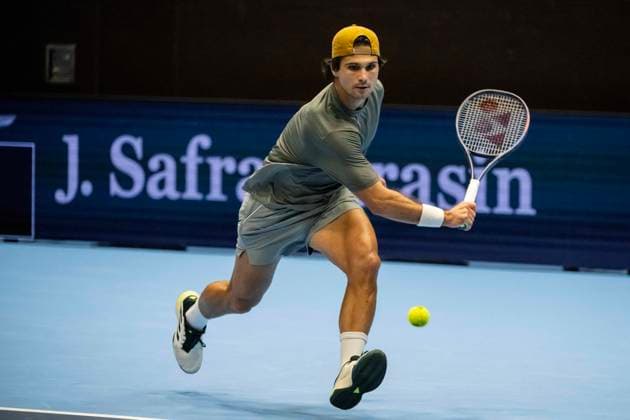 21st October 2025; St. Jakobshalle, Basel, Switzerland; 2025 ATP, Tennis Herren Swiss Indoor Tennis Day 3; Marcos Giron (USA) in action during the match against Denis Shapovalov (CAN) in the first round  DavidxEmm