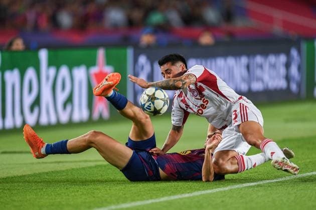 FC Barcelona, Barca v OLIMPIACOS FC OLIMPIC STADIUM LLUIS COMPANYS. MONTJUIC,BARCELONA. October 21,2025 FC BARCELONA vs OLIMPIACOS FC October 21,2025 Fermin Lopez (16) of FC Barcelona vies with Francisco Ortega (3) of Olimpiacos FC during the soccer match corresponding to the third match of the group stage of the UEFA Champions League between FC Barcelona and Olimpiacos FC at Olimpic Stadium Lluis Companys of MontjuÃ¯c in Barcelona, Spain. Barcelona ESP Copyright: xS.xRosx