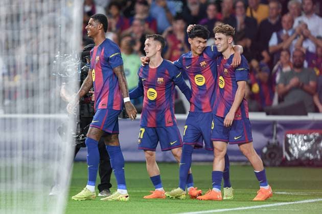 FC Barcelona, Barca v OLIMPIACOS FC OLIMPIC STADIUM LLUIS COMPANYS. MONTJUIC,BARCELONA. October 21,2025 FC BARCELONA vs OLIMPIACOS FC October 21,2025 Fermin Lopez (16) of FC Barcelona celebrates scoring his team s second goal with Dro Fernandez (27) of FC Barcelona and teammates during the soccer match corresponding to the third match of the group stage of the UEFA Champions League between FC Barcelona and Olimpiacos FC at Olimpic Stadium Lluis Companys of MontjuÃ¯c in Barcelona, Spain. Barcelona ESP Copyright: xS.xRosx