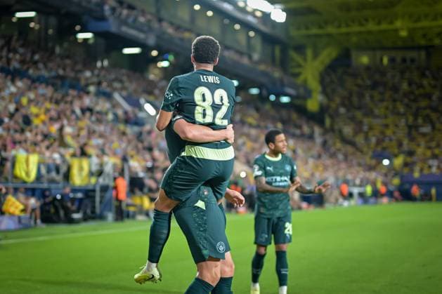 Erling Haaland (Manchester City) and Rico Lewis (Manchester City) are celebrate during a UEFA Champions League match between Villarreal FC and Manchester City at Estadio de La Ceramica in Villarreal, , Spain, on October 21 2025. Photo by Felipe Mondino Copyright: x@FELIPExMONDINOx