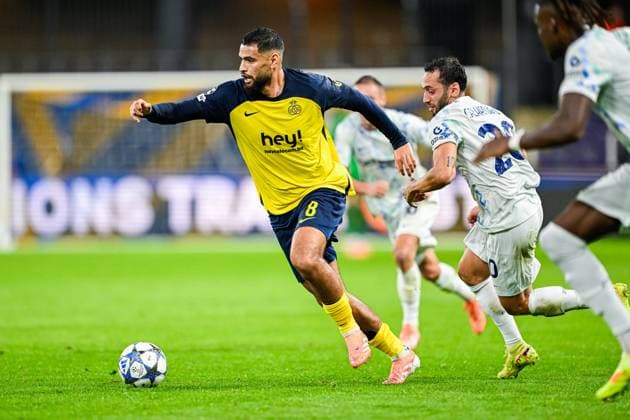 Royale Union Saint-Gilloise v Inter Milan - UEFA Champions League BRUSSELS, BELGIUM - OCTOBER 21 : Calhanoglu Hakan midfielder of FC Internazionale Milano and Zorgane Adem midfielder of Union Saint-Gilloise in action during the UEFA Champions League 2025 26 League Phase MD3 match between Royale Union Saint-Gilloise and Inter Milan on October 21, 2025 in Brussels, Belgium, 21 10 2025 Brussels Belgium  Copyright: xNicoxVereeckenx