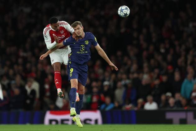 London, England, 21st October 2025. Gabriel of Arsenal and Alexander Sorloth of Atletico Madrid challenge for the ball during the Arsenal vs Atletico Madrid UEFA Champions League match at the Emirates Stadium, London. Picture credit should read: Kieran Cleeves Sportimage EDITORIAL USE ONLY. No use with unauthorised audio, video, data, fixture lists, club league logos or live services. Online in-match use limited to 120 images, no video emulation. No use in betting, games or single club league player publications. SPI_042_KC_Arsenal_v_Atletico_Madrid SPI-4228-0043