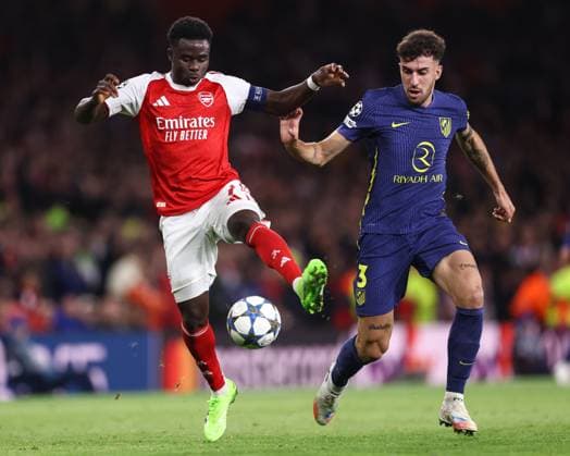 Arsenal v Atletico Madrid 21 October 2025, London - UEFA Champions League - League Stage - Arsenal v Atletico Madrid - Bukayo Saka of Arsenal and Matteo Ruggeri of Atletico Madrid - Photo: Jacques Feeney Offside. London UK Copyright: xJacquesxFeeneyx xOffsidexOffside