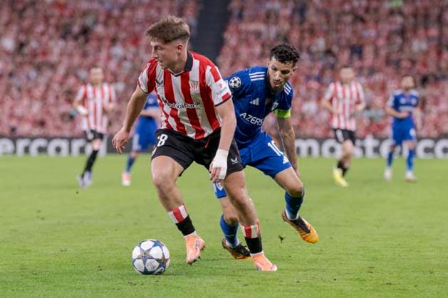 UEFA Champions League Athletic Club vs Qarabag FK Oihan Sancet of Athletic Club attempt to hold possession whilst under pressure from Abdellah Zoubir of Qarabag FK during Champions League 2025 26 League phase match between Athletic Club and Qarabag FK at San mames stadium. Bilbo (Basque Country). October 22, 2025. (Gari Garaialde Bostok Photo) Bilbao Bizkaia Spain Editorial Use Only  Copyright: xGarikoitzxGaraialdex xBostokxPhotox Bostok Photo GarixGaraialdex GG2510220703