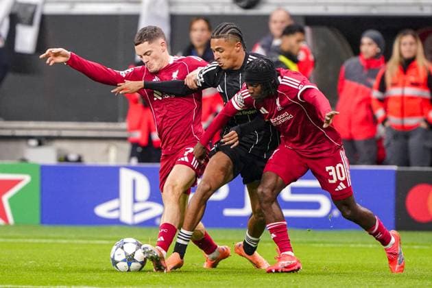 2025-10-22 Eintracht Frankfurt v Liverpool FC - UEFA Champions League 2025 26 League Phase MD3 FRANKFURT AM MAIN, GERMANY - OCTOBER 22: Florian Wirtz of Liverpool FC, Jean-Matteo Bahoya of Eintracht Frankfurt, Jeremie Frimpong of Liverpool FC during the UEFA Champions League 2025 26 League Phase MD3 match between Eintracht Frankfurt and Liverpool FC at Deutsche Bank Park on October 22, 2025 in Frankfurt am Main, Germany. Frankfurt am Main Deutsche Bank Park Germany Content not available for redistribution in The Netherlands directly or indirectly through any third parties. Copyright: xAndrexWeeningx