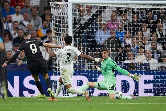 Tibaut Courtois (Real Madrid CF) blocks the ball during the UEFA Champions League 2025 26 League Phase MD3 match between Real Madrid C.F. v Juventus at Estadio Santiago Bernabeu on October 22, 2025 in Madrid, Spain. (Photo by Manu Reino DeFodi Images) Tibaut Courtois Real Madrid CF blocks the ball during the UEFA Champions League 2025 26 League Phase MD3 match between Real Madrid C F v Juventus at Estadio Santiago Bernabeu on October 22, 2025 in Madrid, Spain Photo by Manu Reino DeFodi Images