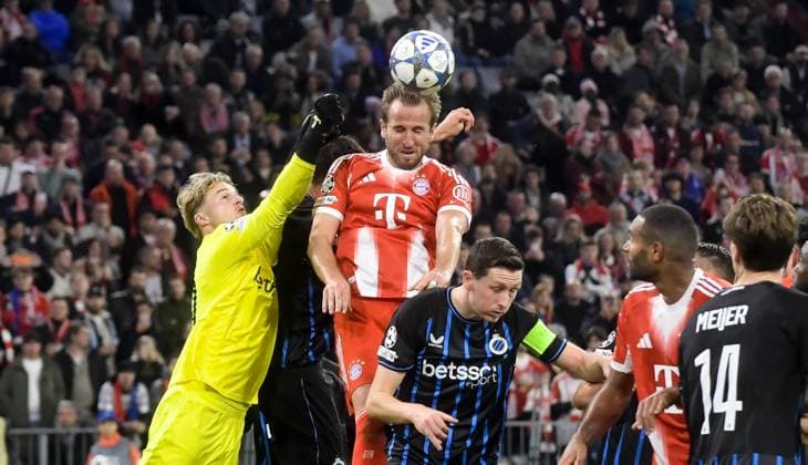 22.10.2025, xemx, Fussball UEFA Champions League, FC Bayern Muenchen - Club Brügge v.l. Nordin Jackers (Club Brügge), Harry Kane (FC Bayern Muenchen) Zweikampf, Aktion, action, battle for the ball (DFL DFB REGULATIONS PROHIBIT ANY USE OF PHOTOGRAPHS as IMAGE SEQUENCES and or QUASI-VIDEO) Muenchen