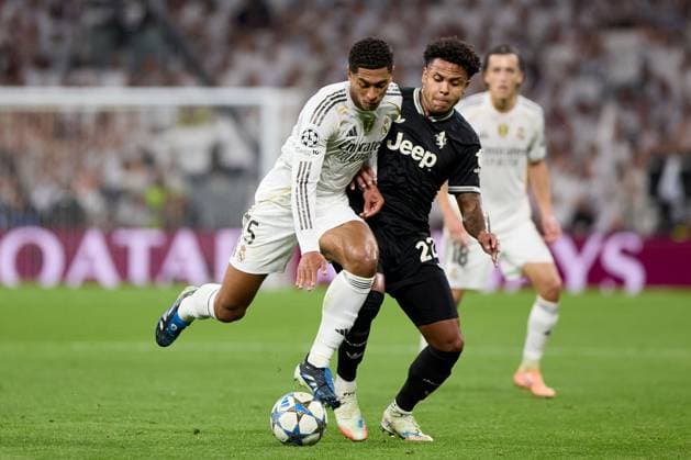 Jude Bellingham of Real Madrid CF and Weston Mckennie of Juventus FC Real Madrid v Juventus, UEFA Champions League, Football, Estadio Santiago Bernabeu, Madrid, Spain - 22 Oct 2025Madrid Estadio Santiago Bernabu Spain EDITORIAL USE ONLY No use with unauthorised audio, video, data, fixture lists, club league logos or live services. Online in-match use limited to 120 images, no video emulation. No use in betting, games or single club league player publications. Copyright: xRubenxAlbarran Shutterstockx 15564869ap