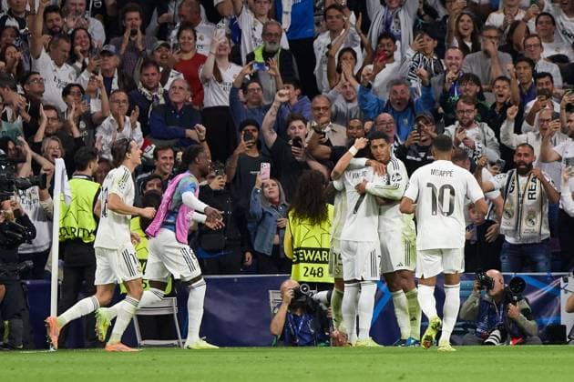 Jude Bellingham of Real Madrid CF celebrates with his teammates after scoring a goal Real Madrid v Juventus, UEFA Champions League, Football, Estadio Santiago Bernabeu, Madrid, Spain - 22 Oct 2025Madrid Estadio Santiago Bernabu Spain EDITORIAL USE ONLY No use with unauthorised audio, video, data, fixture lists, club league logos or live services. Online in-match use limited to 120 images, no video emulation. No use in betting, games or single club league player publications. Copyright: xRubenxAlbarran Shutterstockx 15564869dh