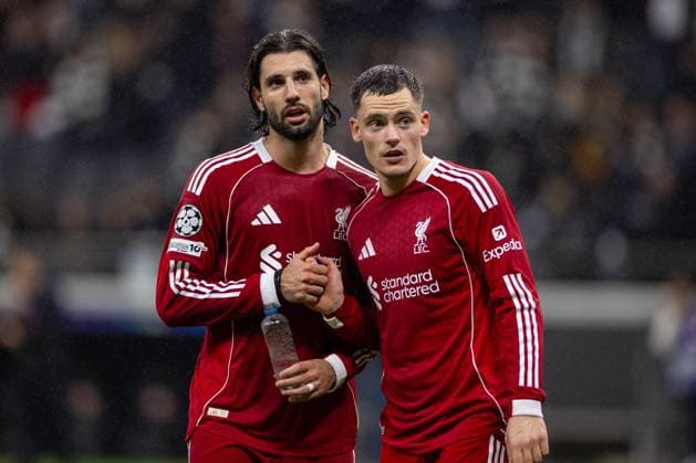 Football - UEFA Champions League - League Phase - Eintracht Frankfurt v Liverpool FC FRANKFURT, GERMANY - Wednesday, October 22, 2025: Liverpool team-mates Dominik Szoboszlai (L) and Florian Wirtz after the UEFA Champions League match between Eintracht Frankfurt and Liverpool FC at the Waldstadion. (Photo by David Rawcliffe Propaganda) FRANKFURT Waldstadion HESSE GERMANY  Copyright: xDavidxRawcliffex P2025-10-22-Frankfurt_Liverpool-120