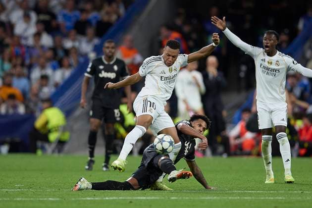 Kylian Mbappe (Real Madrid CF) and Weston McKennie (Juventus Turin) battle for the ball during the UEFA Champions League 2025 26 League Phase MD3 match between Real Madrid C.F. v Juventus at Estadio Santiago Bernabeu on October 22, 2025 in Madrid, Spain. (Photo by Manu Reino DeFodi Images) Kylian Mbappe Real Madrid CF and Weston McKennie Juventus Turin battle for the ball during the UEFA Champions League 2025 26 League Phase MD3 match between Real Madrid C F v Juventus at Estadio Santiago Bernabeu on October 22, 2025 in Madrid, Spain Photo by Manu Reino DeFodi Images