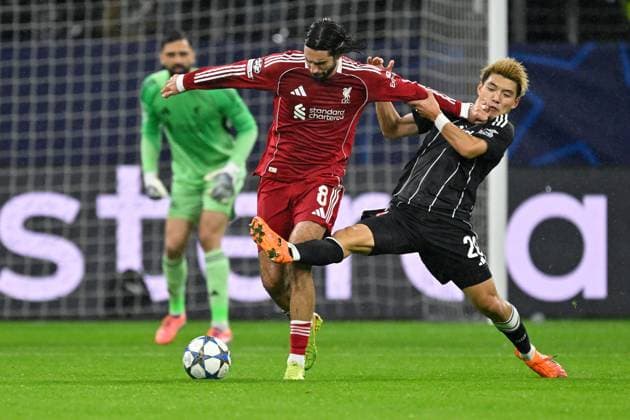 (251023) -- FRANKFURT, Oct. 23, 2025 -- Doan Ritsu (R) of Eintracht Frankfurt vies with Dominik Szoboszlai (C) of Liverpool FC during the UEFA Champions League group stage 3rd round match between Eintracht Frankfurt and Liverpool FC in Frankfurt, Germany, Oct. 22, 2025. (Photo by Xinhua) (SP)GERMANY-FRANKFURT-FOOTBALL-UEFA CHAMPIONS LEAGUE-FRANKFURT VS LIVERPOOL FC UlrichxHufnagel 