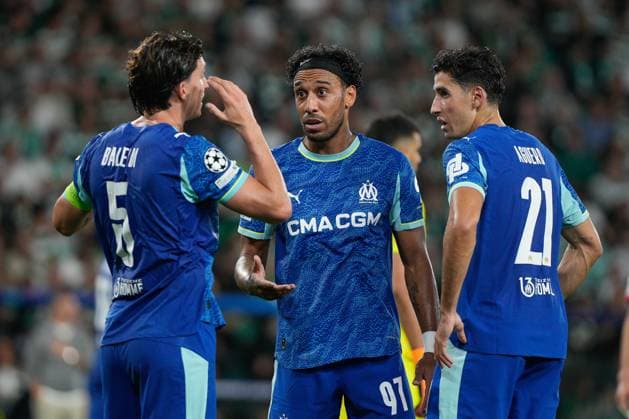 October 22, 2025, Lisbon, Portugal: Leonardo Balerdi of Olympique Marseille (L), Pierre-Emerick Aubameyang of Olympique Marseille (C) and Nayef Aguerd of Olympique Marseille (R) seen in action during UEFA Champions League 2025 26 League phase Matchday 3 between Sporting CP and Olympique de Marseille at Estadio Jose Alvalade. Final score Sporting CP 2 : 1 Olympique Marseille Lisbon Portugal - ZUMAs197 20251022_aaa_s197_465 Copyright: xBrunoxdexCarvalhox