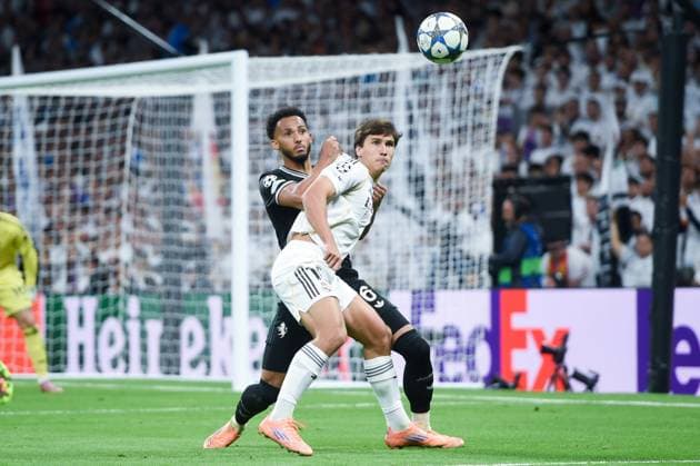 (251023) -- MADRID, Oct. 23, 2025 -- Gonzalo Garcia (R) of Real Madrid vies with Lloyd Kelly of Juventus during the UEFA Champions League football match between Real Madrid and Juventus, at Santiago Bernabeu Stadium, Madrid, Spain, on Oct. 22, 2025. (Photo by Xinhua) (SP)SPAIN-MADRID-FOOTBALL-UEFA CHAMPIONS LEAGUE-REAL MADRID VS JUVENTUS GustavoxValiente 