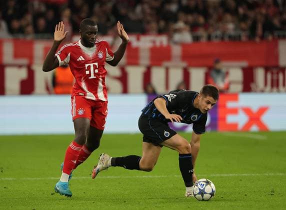 (251023) -- MUNICH, Oct. 23, 2025 -- Dayot Upamecano (L) of Bayern Munich vies with Nicolo Tresoldi of Club Brugge during the UEFA Champions League football match between Bayern Munich and Club Brugge in Munich, Germany, Oct. 22, 2025. (Photo by Xinhua) (SP)GERMANY-MUNICH-FOOTBALL-UEFA CHAMPIONS LEAGUE-BAYERN MUNICH VS BRUGGE PhilippexRuiz 