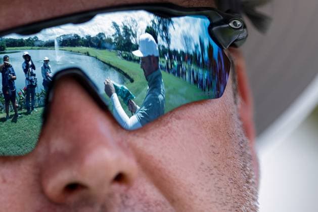 International Series golf in the Philippines Charl Schwartzel (right) of South Africa is reflected on his caddie s shades during the International Series Philippines in Sta. Elena Golf & Country Club, Laguna, south of Manila, Philippines on October 23, 2025. The tournament will run from October 23 to 26, 2025. LAGUNA PHILIPPINES  Copyright: xMatrixxImages MarkxCristinox