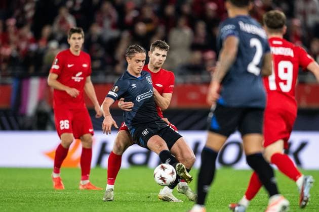 251023 Thelo Aasgaard of Rangers and Jacob Ebsen Sorensen of Brann during the UEFA Europa League football match between Brann and Rangers on October 23, 2025 in Bergen. Photo: Marius Simensen BILDBYRAN COP 238 MM0046 fotboll football soccer fotball uefa europa league brann - rangers bbeng Copyright: MARIUSxSIMENSEN BB251023BB614