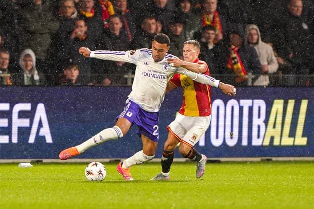 2025-10-23 Go Ahead Eagles v Aston Villa FC - UEFA Europa League 2025 26 League Phase MD3 DEVENTER, NETHERLANDS - OCTOBER 23: Morgan Rogers of Aston Villa battles for possession with Mathis Suray of Go Ahead Eagles during the UEFA Europa League 2025 26 League Phase MD3 match between Go Ahead Eagles and Aston Villa FC at Adelaarshorst on October 23, 2025 in Deventer, Netherlands. Deventer Adelaarshorst Netherlands Content not available for redistribution in The Netherlands directly or indirectly through any third parties. Copyright: xAndrexWeeningx