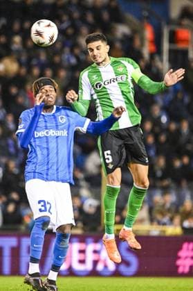Genk s Noah Adedeji-Sternberg and 05? Real Betis s Marc? Bartra pictured in action during a soccer game between Belgian soccer team KRC Genk and Spanish club Real Betis Balompie, on Thursday 23 October 2025, in Genk, third game (out of 8) in the league phase of the UEFA Europa League competition. TOM GOYVAERTS TomxGoyvaerts  x137731357x