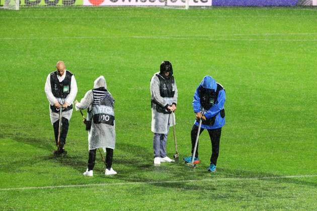HNK Rijeka v AC Sparta Praha: UEFA Conference League A groundsmen attempts to release water from the waterlogged pitch after play is suspended due to heavy rain during the UEFA Conference League group phase matchday 2 between HNK Rijeka and AC Sparta Praha at HNK Rijeka Stadium on October 23, 2025. in Rijeka, Croatia.  GoranxKovacic PIXSELL