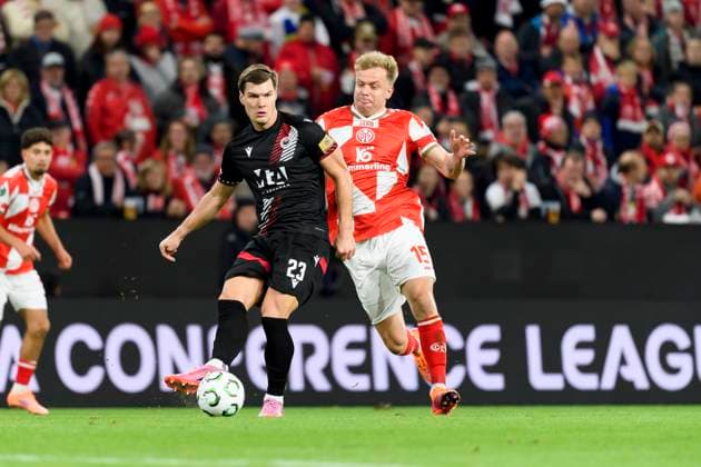 Stefano Surdanovic (HSK Zrinjski Mostar) und Kaishu Sano (1.FSV Mainz 05) battle for the ball during the UEFA Conference League 2025 26 League Phase MD2 match between 1. FSV Mainz 05 and HSK Zrinjski Mostar at Mainz Arena on October 23, 2025 in Mainz, Germany. (Photo by Max Maiwald DeFodi Images) Stefano Surdanovic HSK Zrinjski Mostar and Kaishu Sano 1 FSV Mainz 05 battle for the ball during the UEFA Conference League 2025 26 League Phase MD2 match between 1 FSV Mainz 05 and HSK Zrinjski Mostar at Mainz Arena on October 23, 2025 in Mainz, Germany Photo by Max Maiwald DeFodi Images
