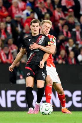 Stefano Surdanovic (HSK Zrinjski Mostar) und Kaishu Sano (1.FSV Mainz 05) battle for the ball during the UEFA Conference League 2025 26 League Phase MD2 match between 1. FSV Mainz 05 and HSK Zrinjski Mostar at Mainz Arena on October 23, 2025 in Mainz, Germany. (Photo by Max Maiwald DeFodi Images) Stefano Surdanovic HSK Zrinjski Mostar and Kaishu Sano 1 FSV Mainz 05 battle for the ball during the UEFA Conference League 2025 26 League Phase MD2 match between 1 FSV Mainz 05 and HSK Zrinjski Mostar at Mainz Arena on October 23, 2025 in Mainz, Germany Photo by Max Maiwald DeFodi Images
