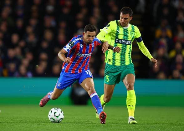 London, England, 23rd October 2025. Yeremi Pino of Crystal Palace and Hrvoje Milicevicx of AEK Larnaca challenge for the ball during the Crystal Palace vs AEK Larnaca UEFA Conference League match at Selhurst Park, London. Picture credit should read: Paul Terry Sportimage EDITORIAL USE ONLY. No use with unauthorised audio, video, data, fixture lists, club league logos or live services. Online in-match use limited to 120 images, no video emulation. No use in betting, games or single club league player publications. SPI_017_PT_Crystal_Palace_Larnaca SPI-4231-0017