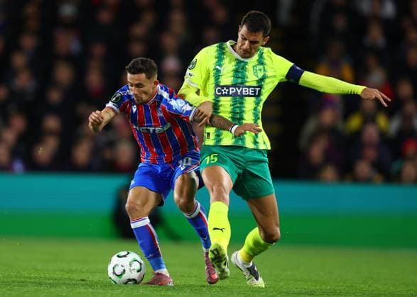 London, England, 23rd October 2025. Yeremi Pino of Crystal Palace and Hrvoje Milicevicx of AEK Larnaca challenge for the ball during the Crystal Palace vs AEK Larnaca UEFA Conference League match at Selhurst Park, London. Picture credit should read: Paul Terry Sportimage EDITORIAL USE ONLY. No use with unauthorised audio, video, data, fixture lists, club league logos or live services. Online in-match use limited to 120 images, no video emulation. No use in betting, games or single club league player publications. SPI_018_PT_Crystal_Palace_Larnaca SPI-4231-0018