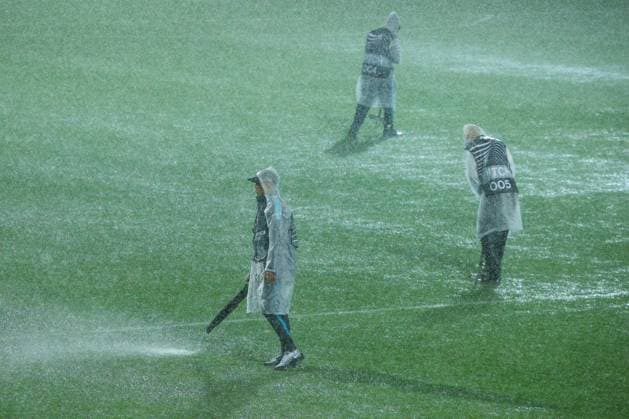 HNK Rijeka v AC Sparta Praha: UEFA Conference League A groundsmen attempts to release water from the waterlogged pitch after play is suspended for second time due to heavy rain during the UEFA Conference League group phase matchday 2 between HNK Rijeka and AC Sparta Praha at HNK Rijeka Stadium on October 23, 2025. in Rijeka, Croatia.  NelxPavletic PIXSELL