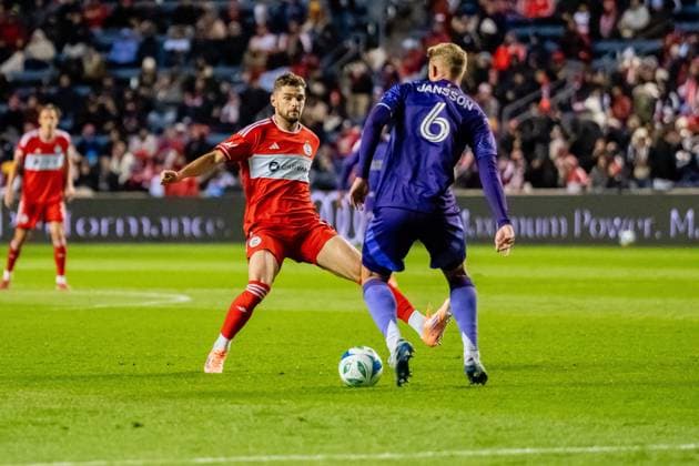 October 23, 2025, Bridgeview, Illinois, United States: Orlando City Defender Robin Jansson (6) and Chicago Fire Forward Hugo Cuypers (9) in action during the Chicago Fire FC vs Orlando City Wildcard match at SeatGeek Stadium. Final Score: Chicago Fire 3:1 Orlando City Bridgeview United States - ZUMAs197 20251023_aaa_s197_392 Copyright: xRajxChavdax