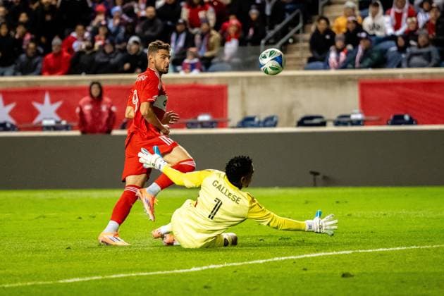 October 23, 2025, Bridgeview, Illinois, United States: Chicago Fire Forward Hugo Cuypers (9) and Orlando City Goalkeeper Pedro Gallese (1) in action during the Chicago Fire FC vs Orlando City Wildcard match at SeatGeek Stadium. Final Score: Chicago Fire 3:1 Orlando City Bridgeview United States - ZUMAs197 20251023_aaa_s197_397 Copyright: xRajxChavdax