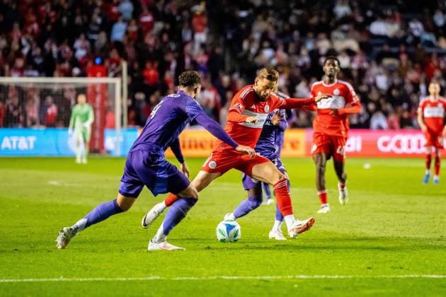 October 23, 2025, Bridgeview, Illinois, United States: Chicago Fire Forward Philip Zinckernagel (11) and Orlando City Defender David Brekalo (4) in action during the Chicago Fire FC vs Orlando City Wildcard match at SeatGeek Stadium. Final Score: Chicago Fire 3:1 Orlando City Bridgeview United States - ZUMAs197 20251023_aaa_s197_398 Copyright: xRajxChavdax