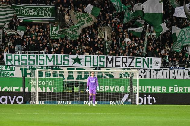 FUERTH, GERMANY - OCTOBER 24: fans from fuerth with a message to MERZ - Rassismus - during the 2. bundesliga match between SpVgg Greuther Fuerth vs. Karlsruher SC on matchday 10 at Sportpark Ronhof Thomas Sommer on October 24, 2025 in Fuerth, Germany DFL REGULATIONS PROHIBIT ANY USE OF PHOTOGRAPHS AS IMAGE SEQUENCES AND OR QUASI-VIDEO Bayern Deutschland Copyright: xBEAUTIFULxSPORTS Goldbergx
