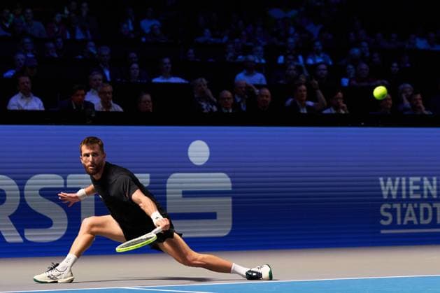 Corentin Moutet of France returns a backhand to Lorenzo Musetti of Italy during the Quarter-finals match at Erste Bank Open 2025 at Wiener Stadthalle on October 24, 2025 in Vienna, Austria. (Photo by Camilla Stolen, Imago) Vienna Austria Copyright: xCamillaxStolenx L1074422