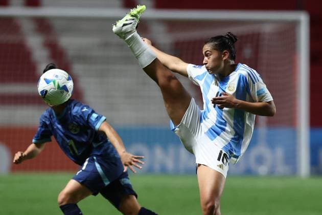 Argentina s midfielder Sofia Dominguez (R) shoots the ball during the CONMEBOL Women s Nations League football match, qualifier for the 2027 World Cup in Brazil, between Argentina and Paraguay, at the Diego Armando Maradona stadium in Buenos Aires, Argentina on October 24, 2025. BUENOS AIRES ARGENTINA Copyright: xALEJANDROxPAGNIx