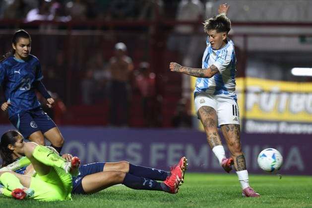 Argentina s forward Yamila Rodriguez (R) shoots next Paraguay s goalkeeper Cristina Recalde (bottom-L) during the CONMEBOL Women s Nations League football match, qualifier for the 2027 World Cup in Brazil, between Argentina and Paraguay, at the Diego Armando Maradona stadium in Buenos Aires, Argentina on October 24, 2025. BUENOS AIRES ARGENTINA Copyright: xALEJANDROxPAGNIx