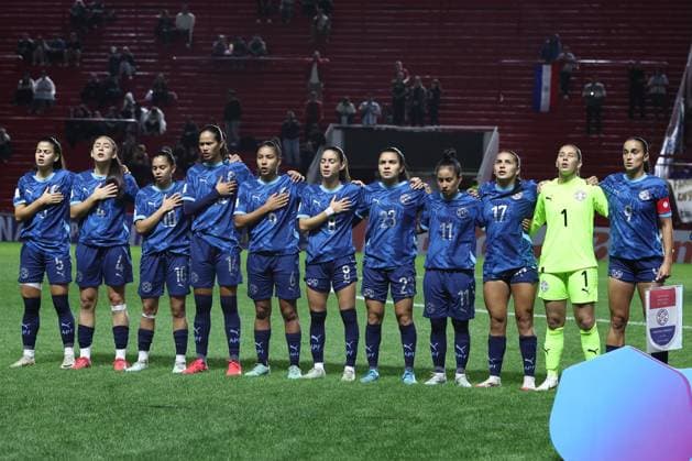 Paraguay™s players sing the national anthem before the CONMEBOL Women s Nations League football match, qualifier for the 2027 World Cup in Brazil, between Argentina and Paraguay, at the Diego Armando Maradona stadium in Buenos Aires, Argentina on October 24, 2025. BUENOS AIRES ARGENTINA Copyright: xALEJANDROxPAGNIx