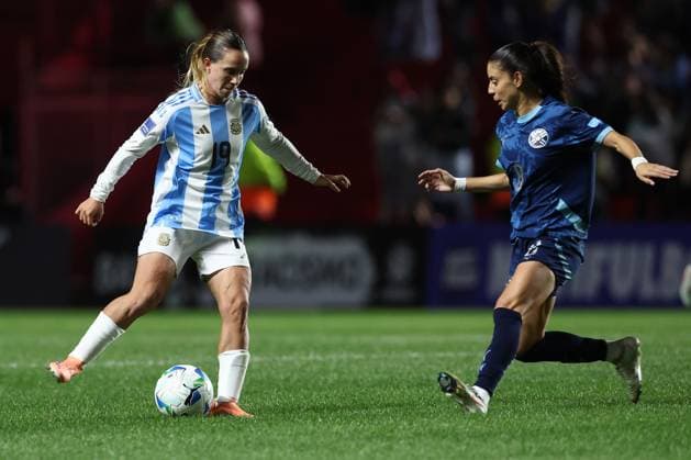 Argentina s midfielder Agostina Holzheier (L) vies for the ball with Paraguay s midfielder Cindy Ramos during the CONMEBOL Women s Nations League football match, qualifier for the 2027 World Cup in Brazil, between Argentina and Paraguay, at the Diego Armando Maradona stadium in Buenos Aires, Argentina on October 24, 2025. BUENOS AIRES ARGENTINA Copyright: xALEJANDROxPAGNIx