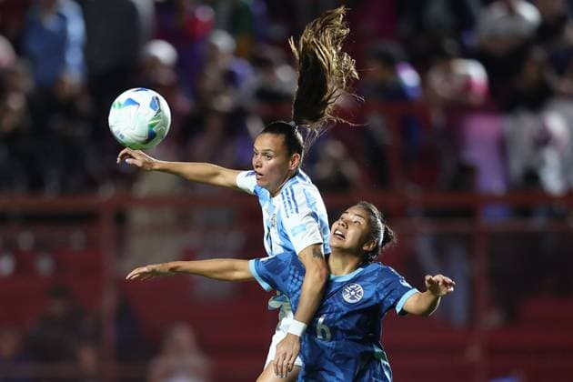Argentina s midfielder Florencia Bonsegundo (top-L) fights for the ball with Paraguay s midfielder Cindy Ramos during the CONMEBOL Women s Nations League football match, qualifier for the 2027 World Cup in Brazil, between Argentina and Paraguay, at the Diego Armando Maradona stadium in Buenos Aires, Argentina on October 24, 2025. BUENOS AIRES ARGENTINA Copyright: xALEJANDROxPAGNIx