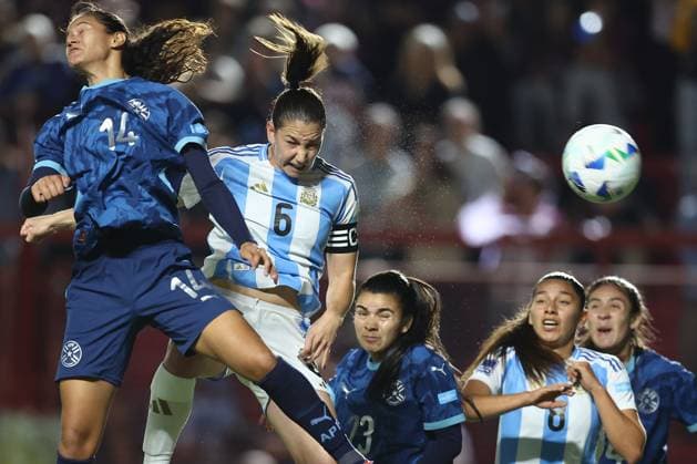 Argentina s defender Aldana Cometti (2nd-L) heads and scores the team™s first goal during the CONMEBOL Women s Nations League football match, qualifier for the 2027 World Cup in Brazil, between Argentina and Paraguay, at the Diego Armando Maradona stadium in Buenos Aires, Argentina on October 24, 2025. BUENOS AIRES ARGENTINA Copyright: xALEJANDROxPAGNIx