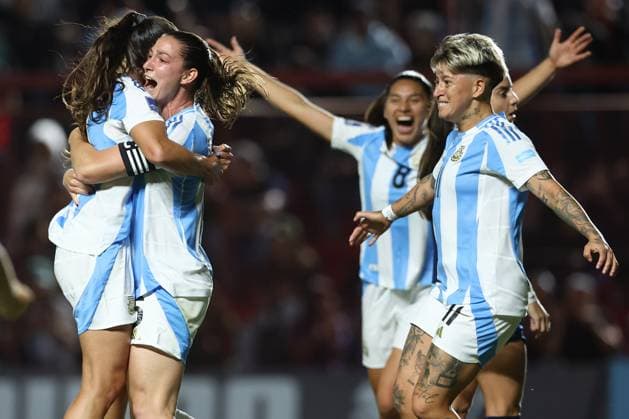 Argentina s defender Aldana Cometti (2nd-L) celebrates with teammates after scoring the team™s first goal during the CONMEBOL Women s Nations League football match, qualifier for the 2027 World Cup in Brazil, between Argentina and Paraguay, at the Diego Armando Maradona stadium in Buenos Aires, Argentina on October 24, 2025. BUENOS AIRES ARGENTINA Copyright: xALEJANDROxPAGNIx