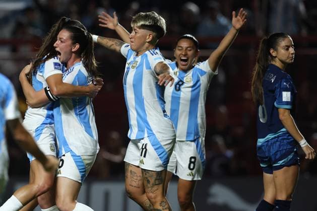 Argentina s defender Aldana Cometti (2nd-L) celebrates with teammates after scoring the team™s first goal during the CONMEBOL Women s Nations League football match, qualifier for the 2027 World Cup in Brazil, between Argentina and Paraguay, at the Diego Armando Maradona stadium in Buenos Aires, Argentina on October 24, 2025. BUENOS AIRES ARGENTINA Copyright: xALEJANDROxPAGNIx