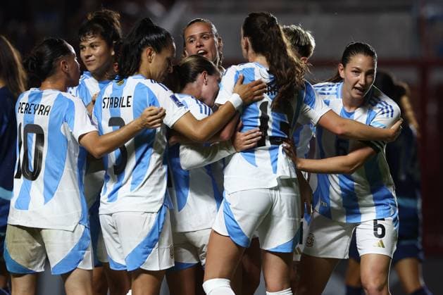 Argentina s defender Aldana Cometti (R) celebrates with teammates after scoring the team™s first goal during the CONMEBOL Women s Nations League football match, qualifier for the 2027 World Cup in Brazil, between Argentina and Paraguay, at the Diego Armando Maradona stadium in Buenos Aires, Argentina on October 24, 2025. BUENOS AIRES ARGENTINA Copyright: xALEJANDROxPAGNIx